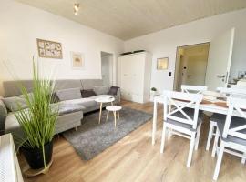 Viesnīca Ferien im Wangerland - Haus Wiesenweg - Ferienwohnung 1 1OG pilsētā Horumerzīla
