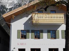 Karls Mittenwald - Design Apartments mit Alpenblick & Tagesbar im Herzen von Mittenwald, hotel en Mittenwald