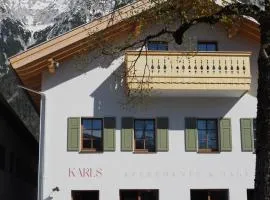 Karls Mittenwald - Design Apartments mit Alpenblick & Tagesbar im Herzen von Mittenwald