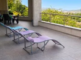 Maison confortable avec vue sur la mer et la montagne à Oletta.