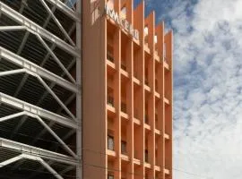 KMCERO Suites