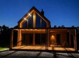 Polesie slow life, nowoczesny domek z tarasem w pobliżu jezior i Poleskiego Parku Narodowego , sauna , jacuzzi