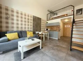 Wrocław Airport Apartment with Mezzanine by BookingHost