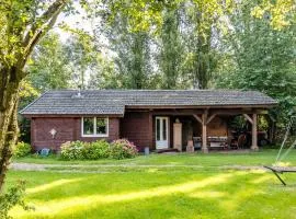 Wooden chalet at the river the Waal