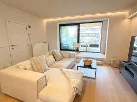 Spacious family duplex with sunny terrace near the beach