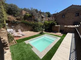 Casa acollidora i familiar amb barbacoa, ξενοδοχείο σε Ager