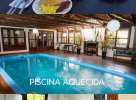 Pousada Porto dos Casais, hotel i Praia do Rosa