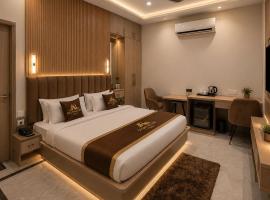 Atlantiis Suites Inn By Signature Stays Near Vishwanath Temple Rathyatra, hotel din Kakarmatha