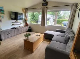 Charmant mobile home dans un domaine forestier