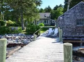 Berry Cottage, private dock, overlooking a sandy b