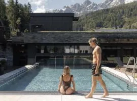 Aparthotel Familiaris - Family Apartments - Pools & Spa in Dolomites