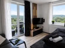 Plně vybavený krásný apartmán 1kk s balkonem, výhledem