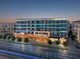 Vienna International Hotel Guangzhou Baiyun International Airport Branch - Free Shuttle Bus to Guangzhou Baiyun International Airport & Free Deliver Service to Canton Fair Complex During Canton Fair Period، فندق في هوادو
