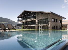 Suitehouse, Premium Apartments, Pools & Spa in Dolomites - by Familiaris, ξενοδοχείο σε Βαλνταόρα