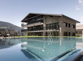 Suitehouse, Premium Apartments, Pools & Spa in Dolomites - by Familiaris
