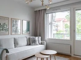 Stylish 1BR Apartment with Private Sauna & Balcony