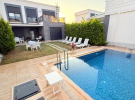Villa Guru Efeler, ξενοδοχείο στο Ντιντίμ