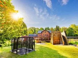 Ferienhaus Bimmelbahn 2 - Familienferienhaus 100 m am Dampflokbahnhof Sauna Trampolin Spielezimmer