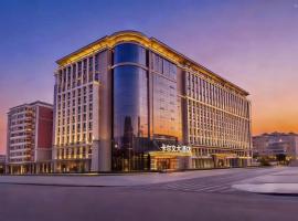 Calvin International Hotel Guangzhou Sanyuanli Baiyun Culture Square Metro Station Exit D Branch - Free Shuttle Bus to Canton Fair Complex During Canton Fair Period, hotel di Guangzhou
