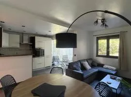 Bright apartment, terrace, garden and parking