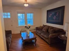 Charming Bungalow on a end st sits on a park