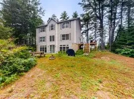 Idyllic waterfront home with furnished deck, grill, sweeping views & private W/D