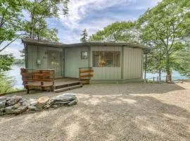 Unique oceanfront home with a deck, tons of natural light, & amazing views