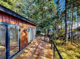 Modern Maine cottage with river views, deck, and a convenient washer/dryer