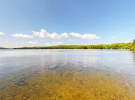 Waterfront cabin w/ outdoor firepit, dock, and lake views - dogs welcome