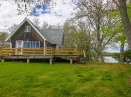 Remodeled Waterfront Home with Wraparound Deck, Water Views, & Beach Access