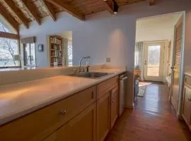 Remodeled Waterfront Home with Wraparound Deck, Water Views, & Beach Access