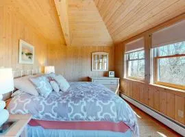 Oceanfront retreat with sunrise views, screened porch, & deck