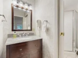 Newly-furnished condo with loft, fast WiFi, partial AC, grills & yard access