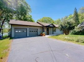 Water-view retreat with beach access, deck, grill, EV charger & lawn games