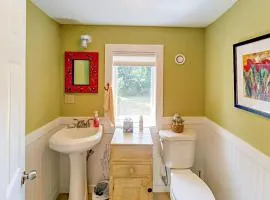 Renovated waterfront cottage with expansive deck, multiple fireplaces, & grill