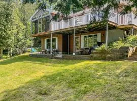 Secluded waterfront home with private dock, outdoor dining, firepit, WiFi & W/D