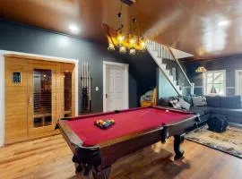 Luxurious waterfront home with deck, firepit, hot tub, fireplace, & pool table