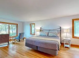 Delightful oceanfront home with amazing views, wrap-around deck & two fireplaces