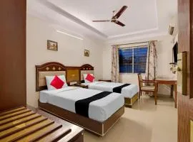 Capital O Elegant Amethyst Business Hotel Near Ragigudda Sri Prasanna Anjaneyaswamy Temple
