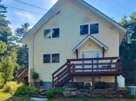 Sunny coastal retreat with deck, grill, beach, dock, & ocean access