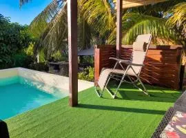 Charmante Maison à Sainte-Rose avec Jacuzzi et Piscine