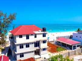 Uroa beachfront apartment, step onto the sand, Hotel in Uroa