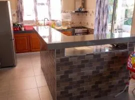 Enchanting Bungalow in Chemin Grenier with Jacuzzi and Garden