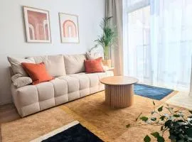 Modern 2-rm apt with Red Light Therapy panel