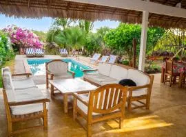 Charming bungalow in Andilana, pool, sea view and garden