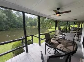 Lakeside condo dog-friendly with AC large porch shared amenities beach access pool tennis