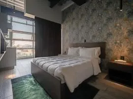The Jungle Loft Tropical Comfort-Centric w/Kitchen