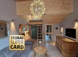 chalet atelier Luxuriöses Chalet mit alpinem Charme