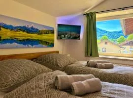 AVINORA Gemütliche Ferienwohnung mit Bergblick