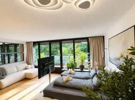 Velmora Boutique Suites - Wellness - Pool, Sauna, E-Bikes direkt am Strand